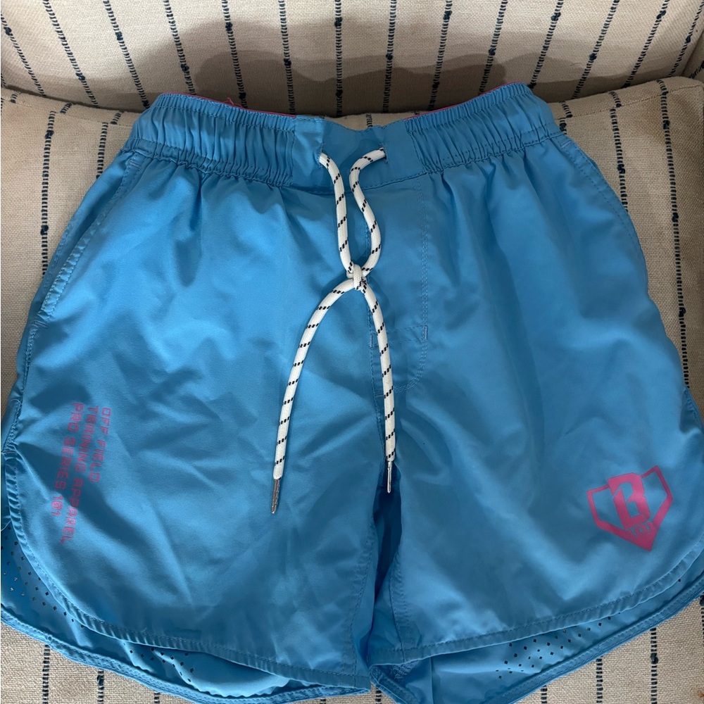 Blue Athletic Shorts with Pink Accents